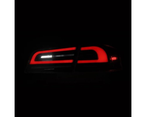 Задние фонари Tesla Model S 2012-2021 с желтым поворотником серии LUXX цвет Alpha-Black 