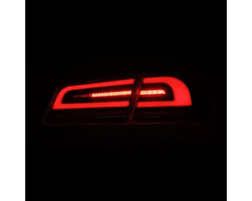Задние фонари Tesla Model S 2012-2021 с желтым поворотником серии LUXX цвет Black Smoke Задние фонари Tesla Model S 2012-2021 с желтым поворотником серии LUXX цвет Black Smoke